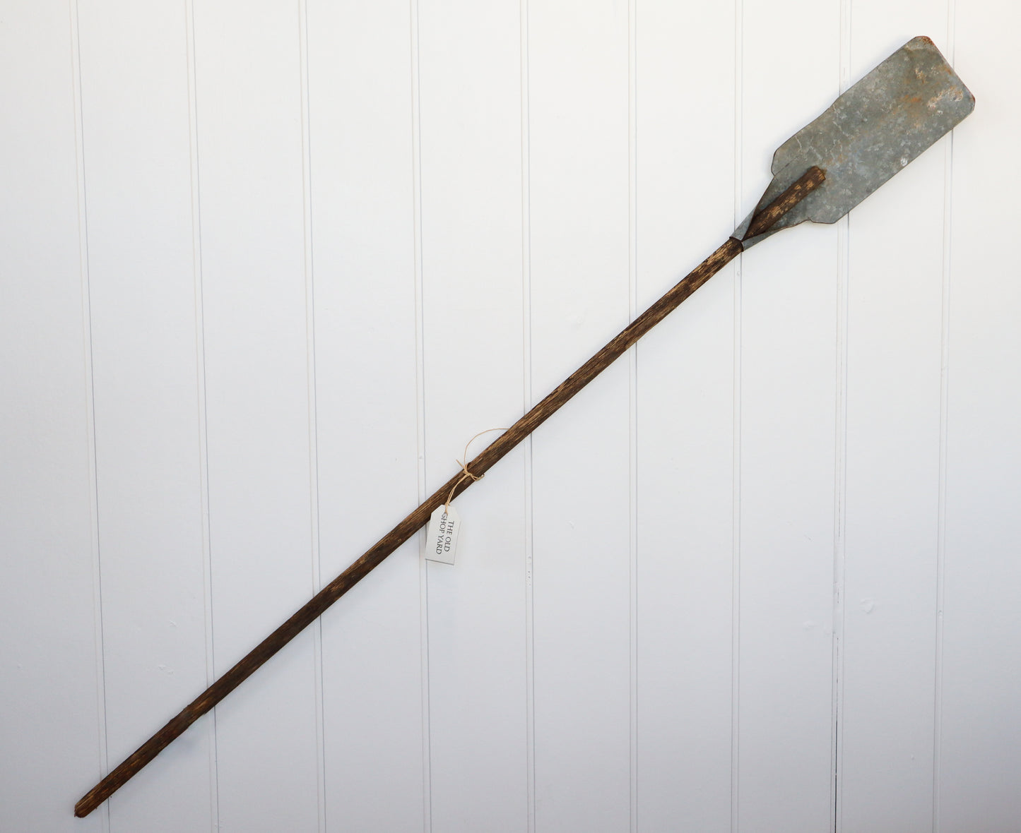 Vintage galvanised metal and wooden paddles