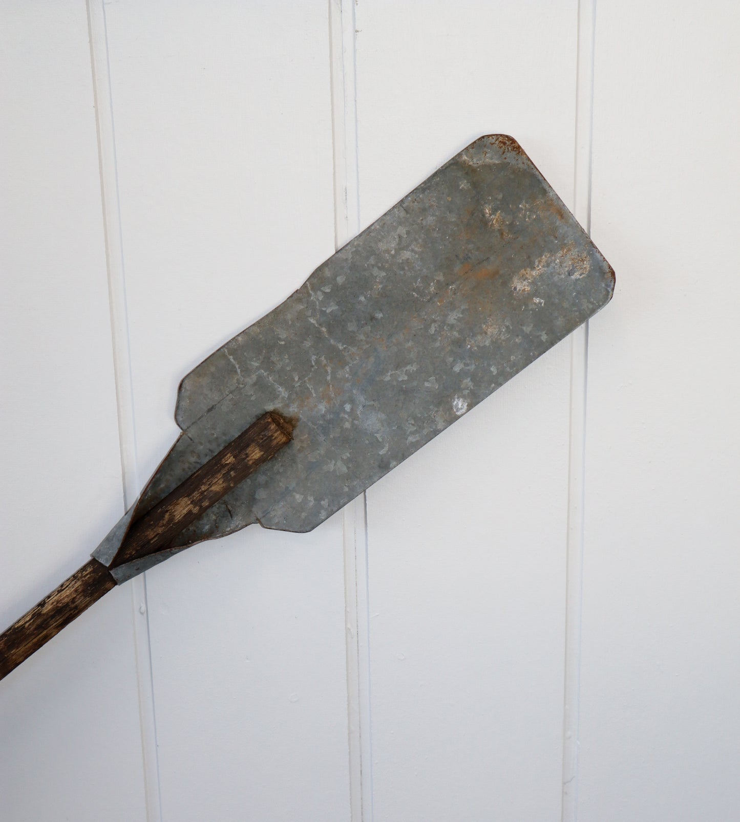 Vintage galvanised metal and wooden paddles
