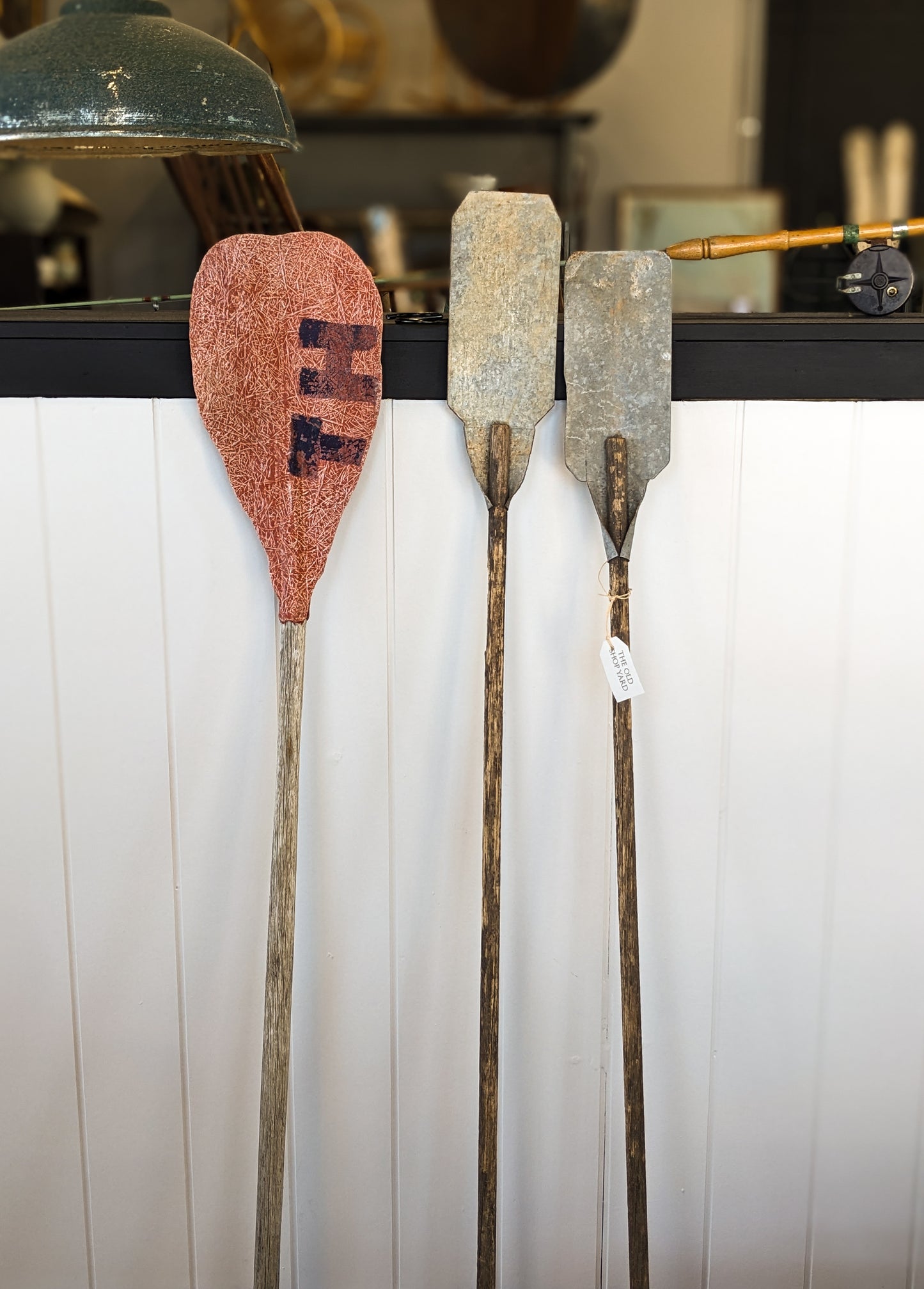 Vintage galvanised metal and wooden paddles