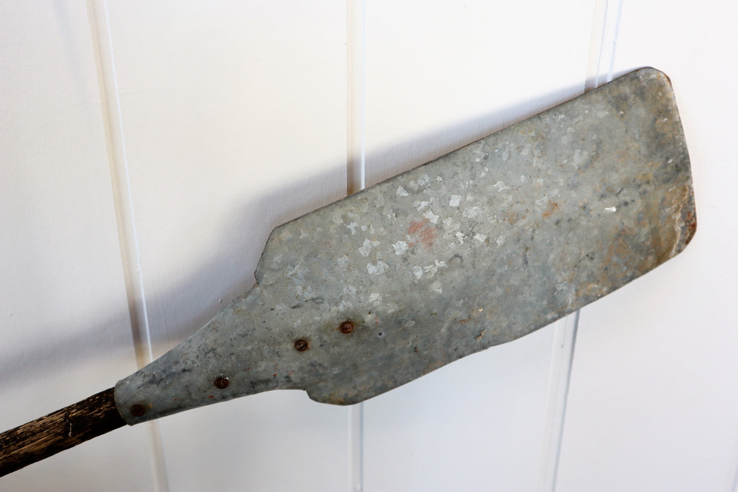 Vintage galvanised metal and wooden paddles