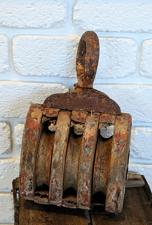 Vintage rustic wooden pulley block